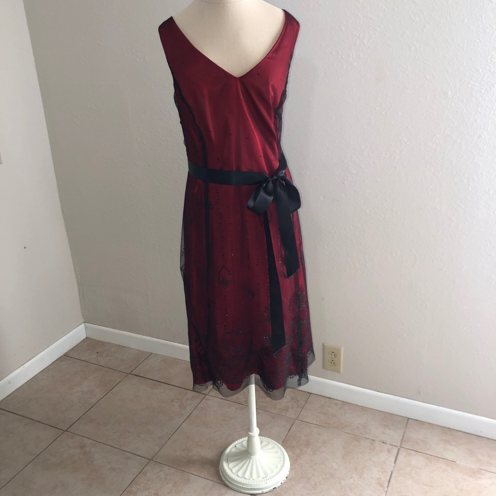 Cocktail dress with black lace overlay